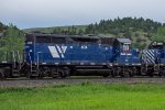 MRL 404 trails on a Westbound Ballast Train 